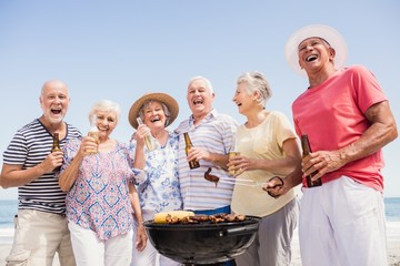 Senior friends having a barbecue