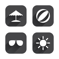 Beach holidays icons. Umbrella and Sunglasses.