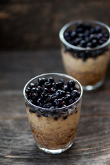 Chia seeds pudding with blueberries in a glass