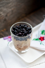 Chia seeds pudding with blueberries in a glass