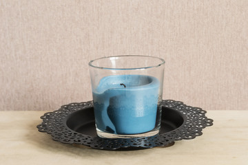 Candle on a plate