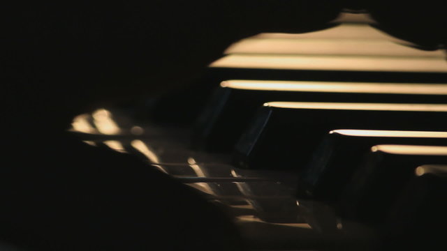 Piano playing, closeup of hands