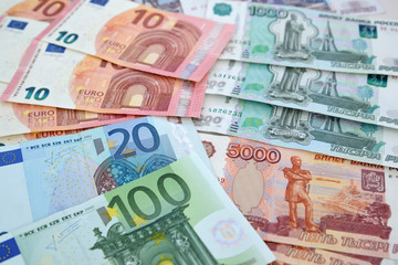 Euro and Russian paper money, background