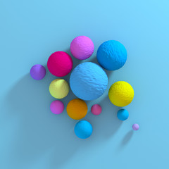 Geometric colorful spheres on blue background.