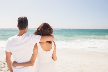 Fototapeta premium Young couple looking at the beach