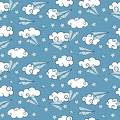 Seamless pattern with paper airplanes in clouds