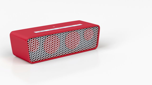 Red wireless speaker on shiny white background