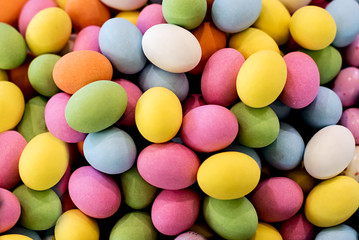 Fototapeta na wymiar Background of colorful chocolate Easter eggs