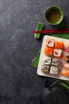 Set of sushi, maki and green tea