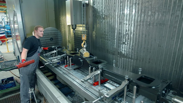 A young man is double checking the process