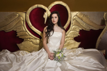 Gorgeous young bride at interior