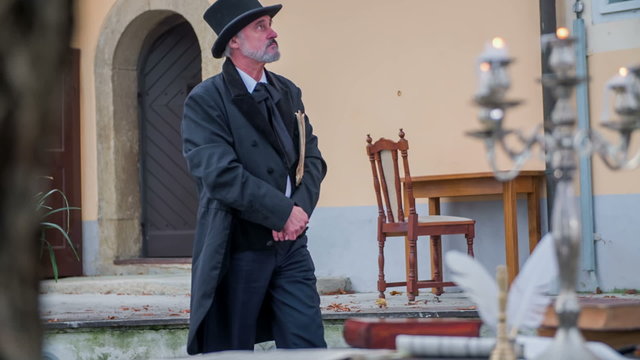 Composer walking around the house to find an inspiration 