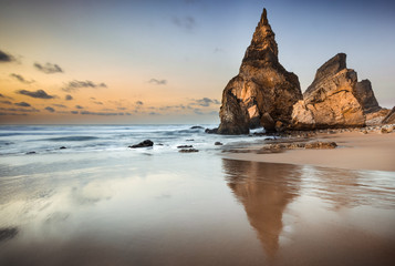 Sunset at isolated and beautiful beach, rock formation - 105054514