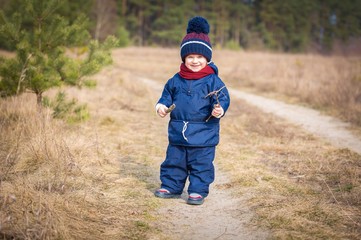 Happy caucasian child playing outdoor