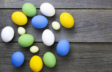 Easter eggs in nest on rustic wooden background, selective focus image, Card Happy Easter