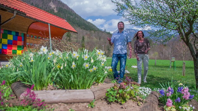A couple in love looking a beehive in nature
