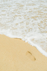 beach, wave and footsteps