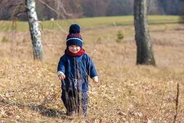 Happy caucasian child playing outdoor