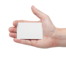 white card in a human hand isolated on white background