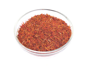 Saffron and bowl separated on white background