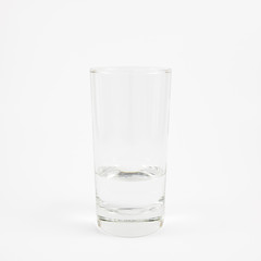 The tall glass of pure mineral water.