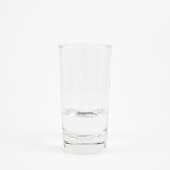 The tall glass of pure mineral water.