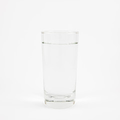 The tall glass of pure mineral water.