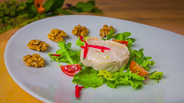 Nice decorated salad with chicken breasts