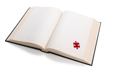 open book and puzzle