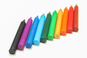 rainbow  wax crayons stairs lay on white