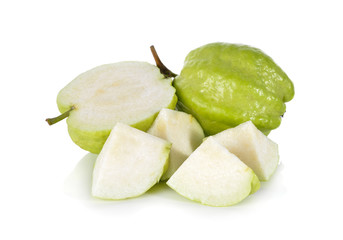 whole and half cut fresh Guava with stem on white background