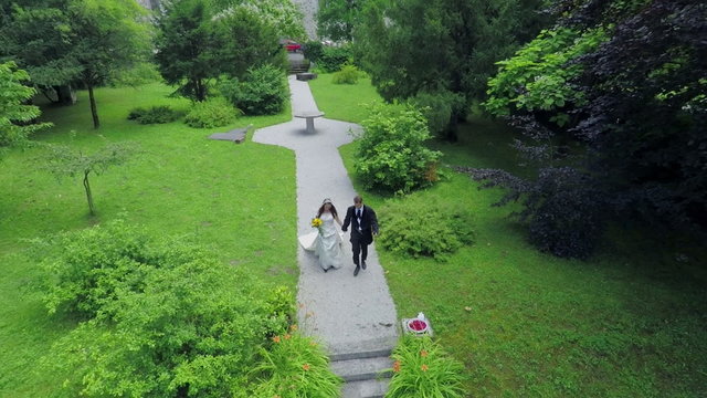 Married couple is walking in the park