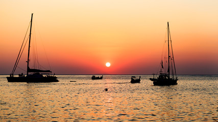 Sunset on the sea with boat