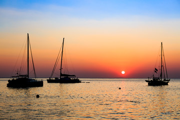 Sunset on the sea with boat