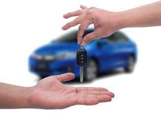 Man handing man automobile keys. New Car