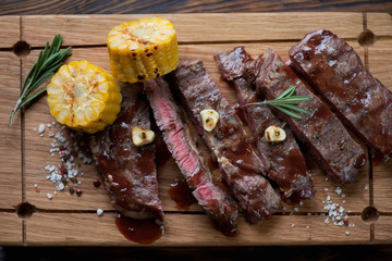 Closeup of sliced medium rare grilled rancho beefsteak, top view