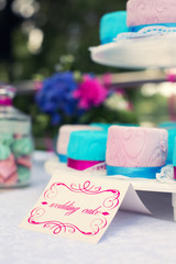 wedding cakes and the decorative plate with an inscription