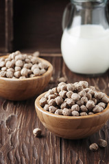 bran and milk for breakfast on the wooden table