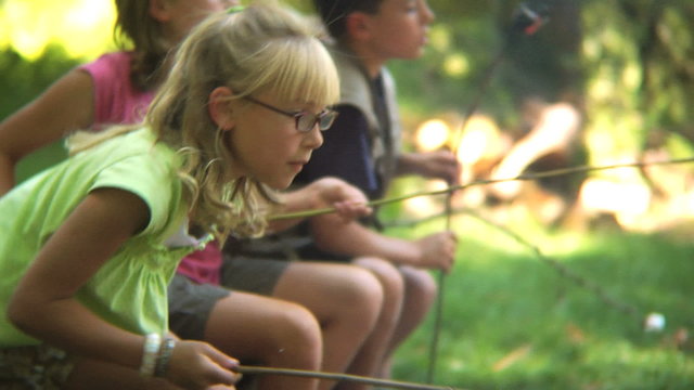 Children roasting marshmallows