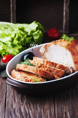 meat baked with olive on the wooden table