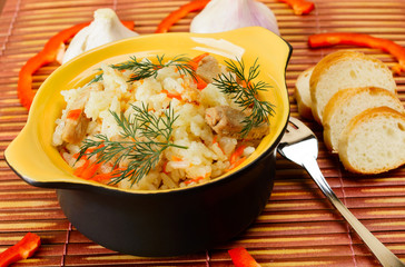 Ceramic bowl with rice pilaf.