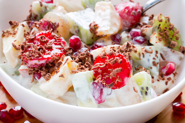 fruit salad with ice cream closeup