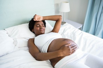 Fototapeta na wymiar Pregnant woman with headache