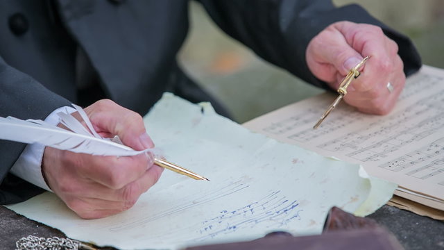 Writing a poem with a feather 