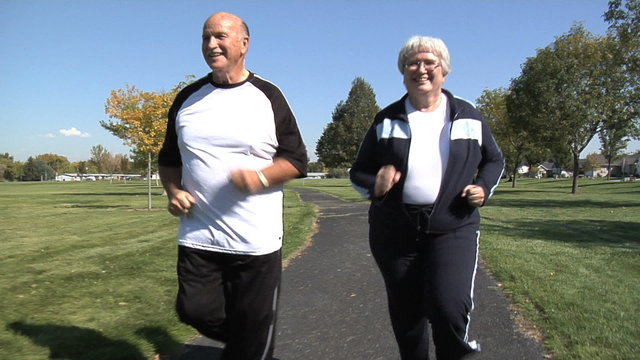 Senior couple jogging at park