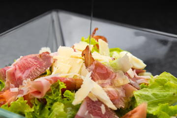 fresh salad with cheese and ham