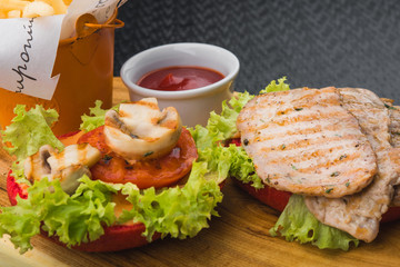 burger and grilled vegetables
