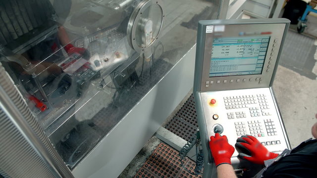 A computer that a supervisior in the factory is using