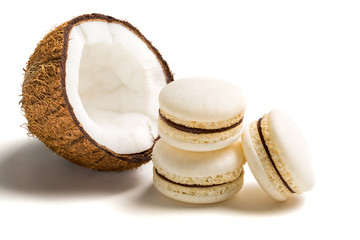 Fototapeta na wymiar Sweet macaroons with coconut on white background