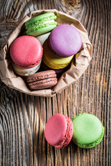 Fresh macaroons to takeaway in paper bag